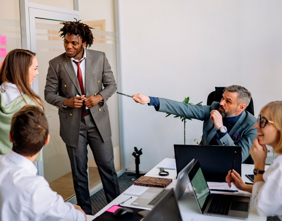 Five coworkers are talking about a project they will do together